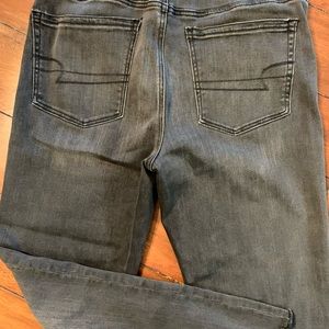 AMERICAN EAGLE sz 12 high rise button down cropped raw edge boot cut.